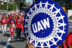 United Auto Workers members walk in the Labor Day parade in Detroit, Sept. 2, 2019.