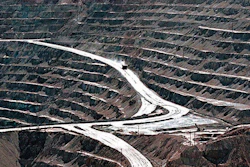 Terraces cut into the hillside at the huge Santa Rita copper mine in Grant County, N.M., are shown in this March 1999 file photo.