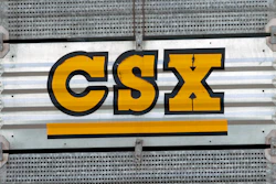 The CSX logo is seen, July 15, 2013, Nashville, Tenn. A railroad worker was crushed to death between two railcars early Sunday, Sept. 17, 2023, by a remote-controlled train in a CSX railyard in Ohio, raising concerns among unions about such technology.