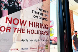A hiring sign is displayed at a retail store in Vernon Hills, Ill., Thursday, Aug. 31, 2023.