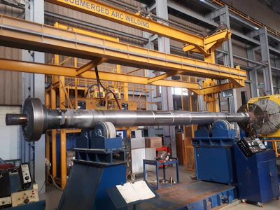 Submerged arc welding (SAW) was used to apply an upgraded, high-strength low-alloy steel weld material, building up the diameter of the shaft.