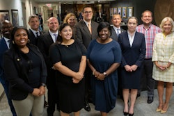 ​​NTSB Chair Jennifer Homendy (right) with some of the 15 new employees sworn in this week. The agency now has 433 staffers.