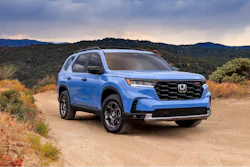 This photo provided by Honda shows the 2024 Pilot three-row SUV. Its distinctive TrailSport trim has a raised stance and all-terrain tires to enhance off-road capability.