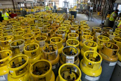 Used refrigerant cylinders sit in a warehouse at the A-Gas Rhome facility on Monday, Oct. 9, 2023, in Rhome, Texas. The company takes in shipments of refrigerators and tanks from around the country and beyond, drains them, then purifies and reclaims the chemicals, shipping out recycled product. This prevents the need for new chemical production.