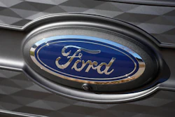 The Ford company logo is shown on Thursday, Nov. 25, 2022, outside a Ford dealership in southeast Denver.