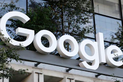 The Google sign is shown over an entrance to the company's new building in New York on Wednesday, Sept. 6, 2023.