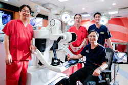 Professor Koichi Suda and Professor Ichiro Uyama from Fujita Health University with Dr Kim Guowei and Professor Jimmy So (seated) from the National University Hospital and National University of Singapore.