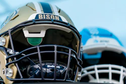Football helmets that help deaf and hard-of-hearing players see play calls on a lens inside are displayed before an NCAA college football game between the Gallaudet and Hilbert College, Saturday, Oct. 7, 2023, in Washington.