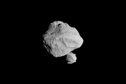 This photo provided by NASA shows a photo taken by the Lucy spacecraft during Wednesday, Nov. 1, 2023 flyby of asteroid Dinkinesh, 300 million miles from Earth. It turns out Dinkinesh, which is only a half-mile across, has a dinky sidekick ... just one-tenth of a mile across.