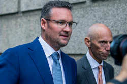 Trevor Milton, left, leaves the Thurgood Marshall United States Courthouse, Sept. 12, 2022, in New York.