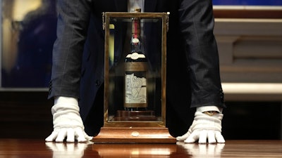 A bottle of Macallan Adami 1926 whisky displayed during a media preview, Sotheby's auction house, London, Oct. 19, 2023.