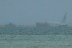 A downed U.S. Navy aircraft is seen in Kaneohe Bay, Monday, Nov. 20, 2023, in Kaneohe, Hawaii.