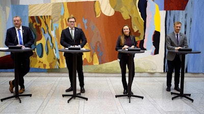 From left: Terje Halleland (Progress Party), Aleksander Oren Heen (Center Party), Marianne Sivertsen Naess (Labour Party) and Bard Ludvig Thorheim (Conservative Party) give a joint press conference on the deal on extraction of seabed minerals made between the governing party and two large opposition parties, in Oslo, Norway, Tuesday Dec. 5, 2023.
