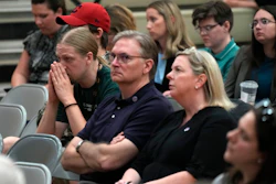 People listen during a National Transportation Safety Board investigative hearing at East Palestine High School, discussing the Feb. 3, 2023, Norfolk Southern Railway train derailment and subsequent hazardous material release and fires in East Palestine, Ohio, Thursday, June 22, 2023.
