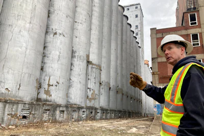 Chris Richmond, president of Moving Pillsbury Forward, the nonprofit formed to demolish and redevelop the former Pillsbury Mills plant in Springfield, Ill., discusses the 160 separate, 100-foot-tall silos that must be razed, Dec. 30, 2022.