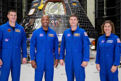 Artemis II crew members, from left, Jeremy Hansen, Victor Glover, Reid Wiseman and Christina Koch, stand together at NASA's Kennedy Space Center in Florida, in front of an Orion crew module on Tuesday, Aug. 8, 2023.