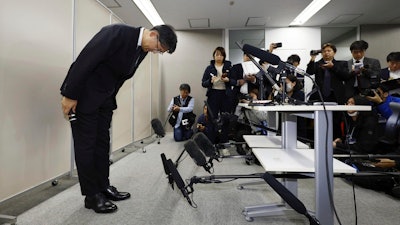 Toyota Motor Corp. CEO Koji Sato bows in front of the media in Tokyo, Japan, Monday, Jan 29, 2024.