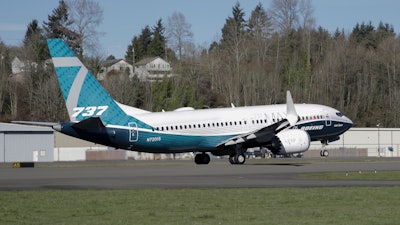 A Boeing 737 MAX 7 takes off on its first flight, Friday, March 16, 2018, in Renton, Wash.