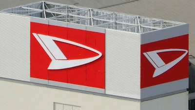 This aerial photo shows the logo of Daihatsu Motor Co. at its headquarters in Ikeda, north of Osaka, Japan, on Dec. 20, 2023.