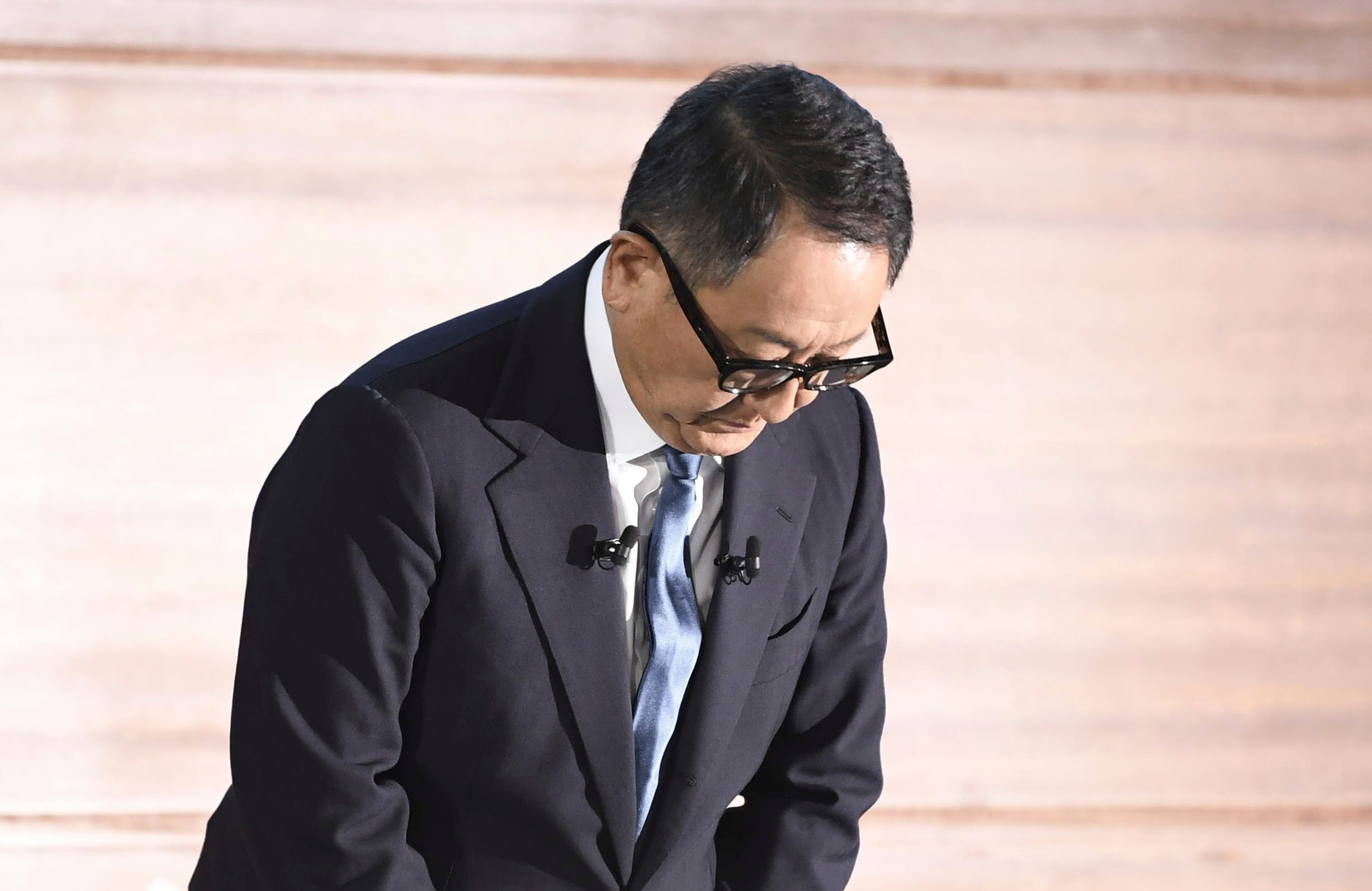Toyota Chairman Akio Toyoda bows during a news conference in Nagoya, central Japan, Tuesday, Jan. 30, 2024.