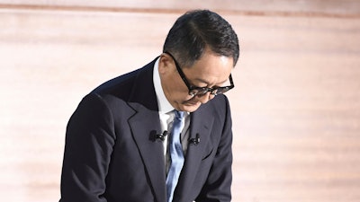 Toyota Chairman Akio Toyoda bows during a news conference in Nagoya, central Japan, Tuesday, Jan. 30, 2024.
