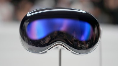 The Apple Vision Pro headset is displayed in a showroom on the Apple campus after it's unveiling on June 5, 2023, in Cupertino, Calif.