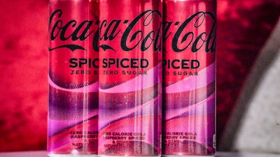 Cans of Coca-Cola Spiced, the beverage company's first new permanent offering to its North American portfolio in three years, are introduced at a livestream media event, Tuesday, Feb. 6, 2024, in New York.