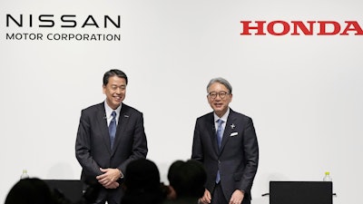 Nissan Chief Executive Makoto Uchida, left, and Honda President Toshihiro Mibe attend a joint news conference in Tokyo, Friday, March 15, 2024.