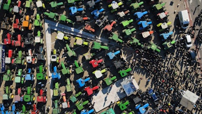 Protesting farmers in tractors rally outside an agricultural fair in Thessaloniki, Greece, Feb. 1, 2024.