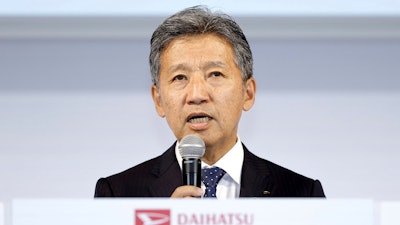 Daihatsu President Masahiro Inoue speaks during a press conference in Tokyo Monday, April 8, 2024. Daihatsu, the Japanese automaker mired in a scandal over fraudulent vehicle tests, will hand over its model certification duties to parent company Toyota, to regain trust among dealers, customers and workers, its new president said Monday.