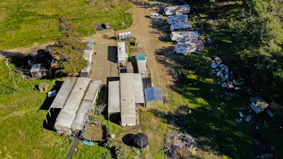 A drone photo of mobile homes at the California Terra Garden, formerly Mountain Mushroom Farm, in Half Moon Bay, Calif., Jan. 26, 2023.