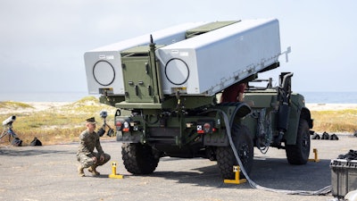 The Remotely Operated Ground Unit for Expeditionary Fires (ROGUE-Fires) to be used in the Navy/Marine Expeditionary Ship Interdiction System.