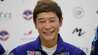 Space flight participant Yusaku Maezawa attends a news conference ahead of the expedition to the International Space Station at the Gagarin Cosmonauts' Training Center in Star City outside Moscow, Russia, on Oct. 14, 2021.