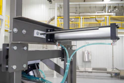 By combining hygienic bag clamps with the tensioning action of spring-loaded bag support arms, liner distension into downstream equipment can be prevented.