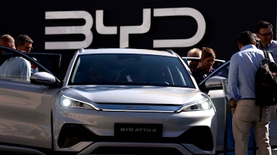Visitors check the China made BYD ATTO 3 at the IAA motor show in Munich, Germany, on Sept. 8, 2023.