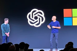 OpenAI CEO Sam Altman, left, appears onstage with Microsoft CEO Satya Nadella at OpenAI's first developer conference.