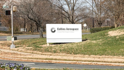 A street sign for Collins Aerospace.
