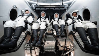 This photo provided by SpaceX shows, from left, Russian Aleksandr Gorbunov, and NASA's Nick Hague, Zena Cardman and Stephanie Wilson at SpaceX headquarters in Hawthorne, Calif., on May 6, 2024.