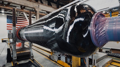 Northrop Grumman performs the insulation layup and composite case wind of its 2024 SMART Demo solid rocket motor case.