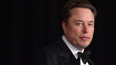 Elon Musk arrives at the 10th Breakthrough Prize Ceremony on April 13, 2024, at the Academy Museum of Motion Pictures in Los Angeles. Attorneys for Musk and Tesla’s corporate directors are asking a Delaware judge on Friday, Aug. 2, 2024, to vacate her ruling requiring the company to rescind a massive and unprecedented pay package for Musk.