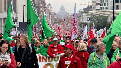 Workers of the German automaker Audi protest the threat of massive layoffs in downtown Brussels, Belgium, Monday Sept. 16, 2024.