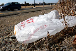A plastic bag sits along a roadside in Sacramento, Calif., Oct. 25, 2013.