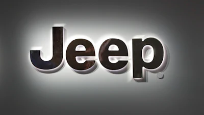A Jeep logo is displayed at the North American International Auto Show in Detroit.