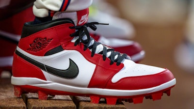 Atlanta Braves outfielder Jorge Soler wears custom Nike Air Jordan cleats in the dugout during the seventh inning of a baseball game against the Colorado Rockies, Sept. 5, 2024, in Atlanta.