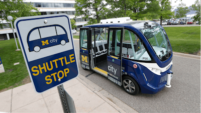 An Mcity driverless shuttle makes a stop on June 4, 2018 at the University of Michigan in Ann Arbor, Mich.