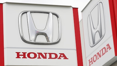 Logos of Honda Motor Co. are pictured in Tsukuba, northeast of Tokyo.