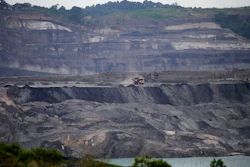 A dump truck carrying coal navigates its way near a coal mining pit in Sanga-Sanga, East Kalimantan, Indonesia, Dec. 20, 2022.