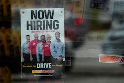 A hiring sign is displayed at a retail store in Buffalo Grove, Ill., Wednesday, Nov. 6, 2024.