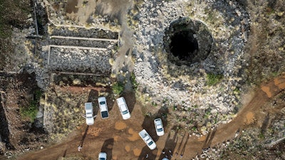 An aerial view of a mine shaft where an estimated 4000 illegal miners are trapped in a disused mine in Stilfontein, South Africa, Wednesday, Nov.13, 2024.