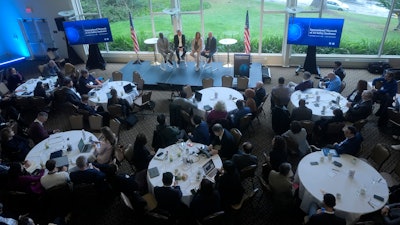 Attendees listen during a panel discussion at the convening of the International Network of AI Safety Institutes at the Golden Gate Club at the Presidio in San Francisco, Wednesday, Nov. 20, 2024.